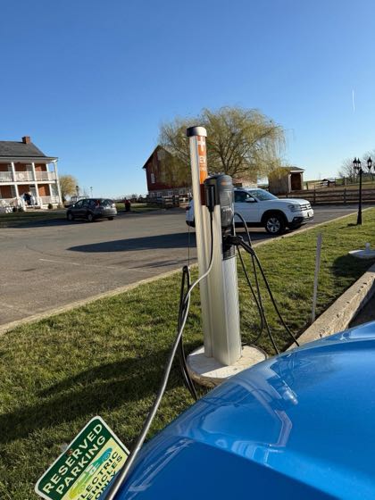 EV charger at The Red Caboose Motel at Paradise Station